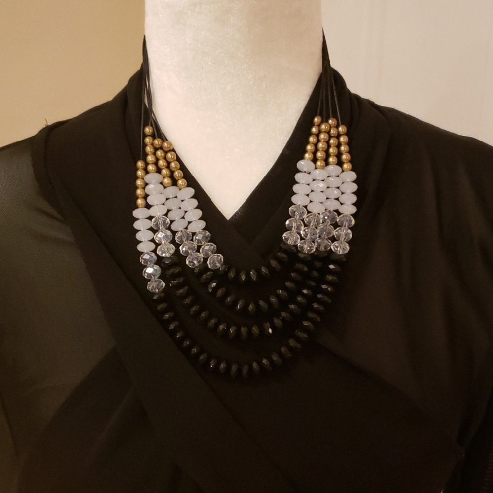 Black, Clear and gold necklace